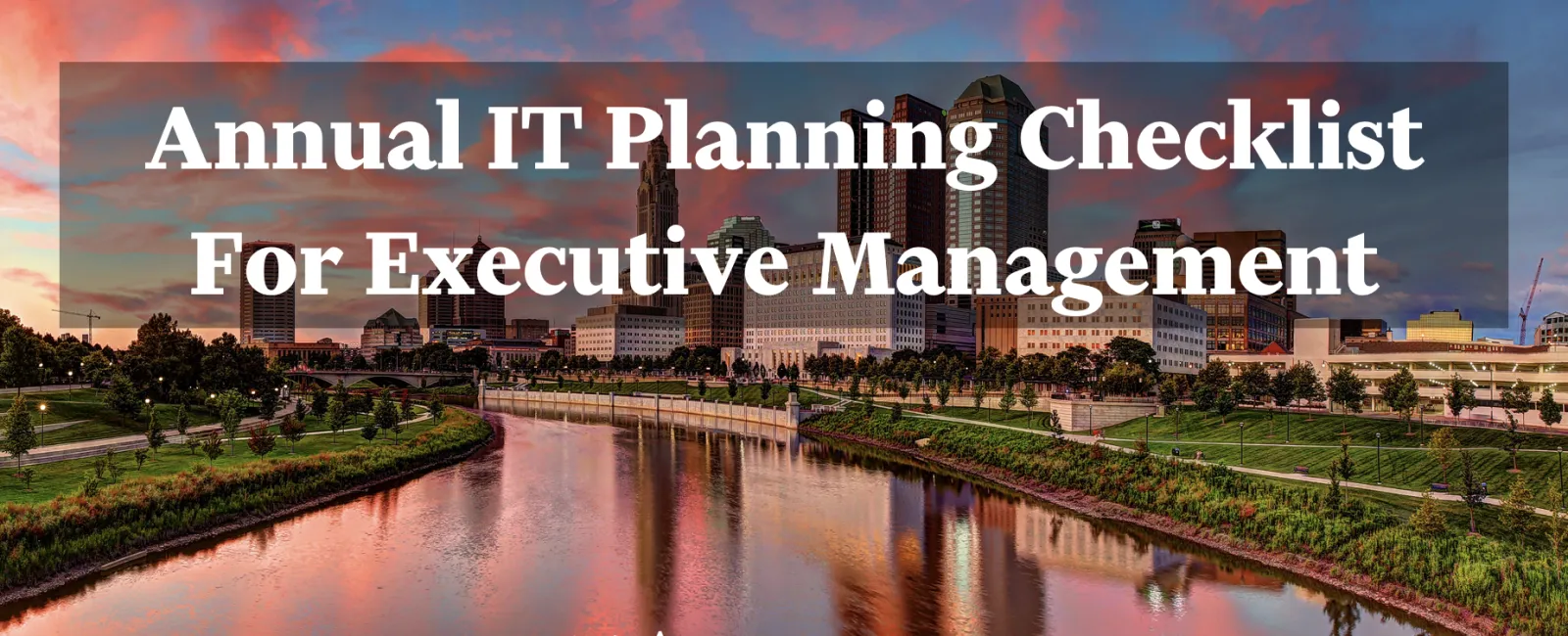 City skyline at sunset with river reflections and text about annual IT planning checklist for executives.