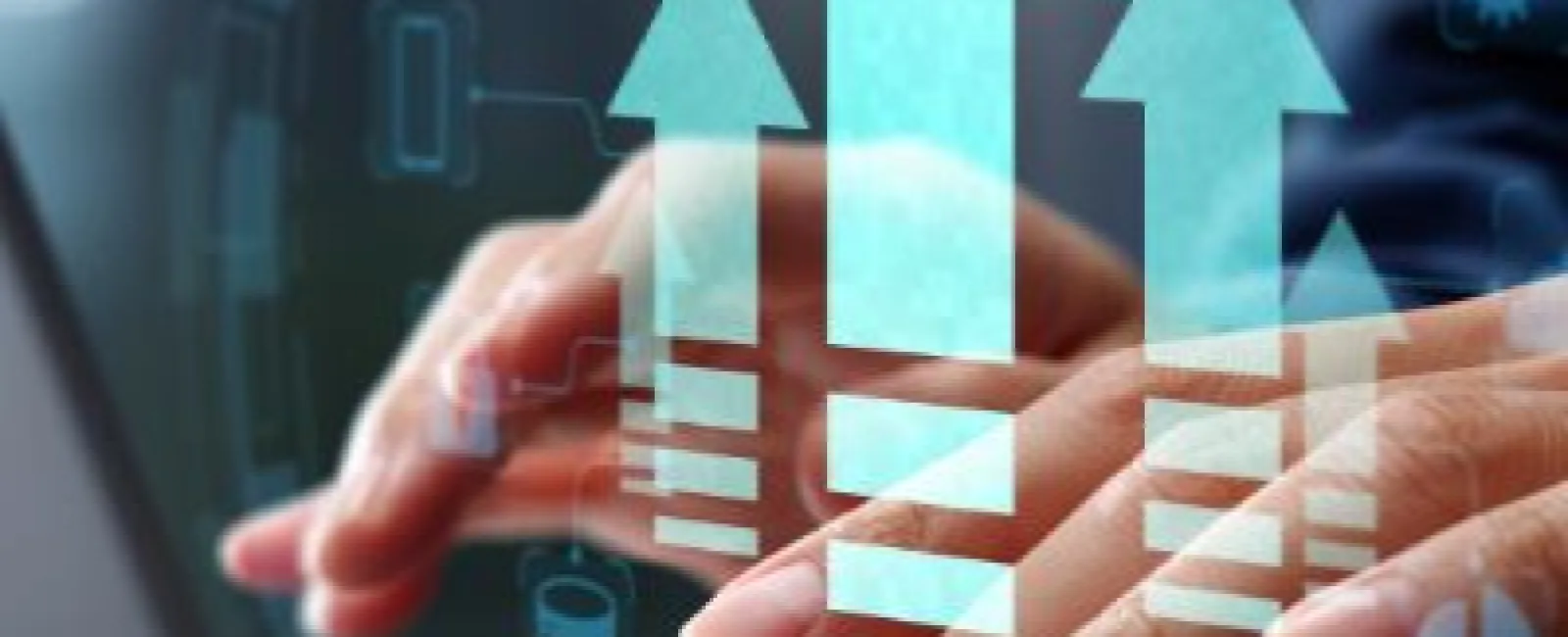 Hands typing on a laptop keyboard with digital upward arrows representing growth and progress