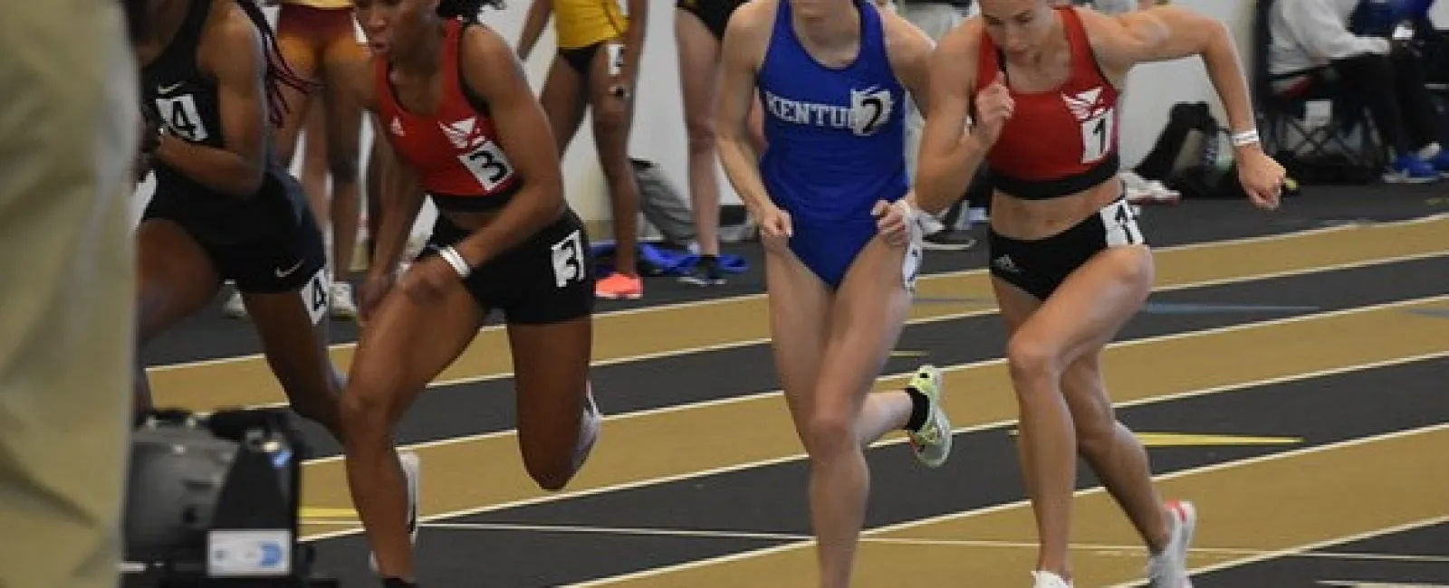 a group of runners on a track