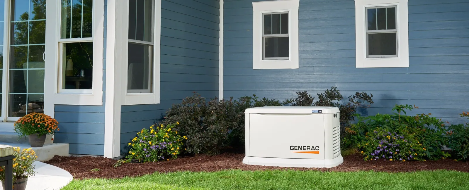 a white refrigerator in front of a house