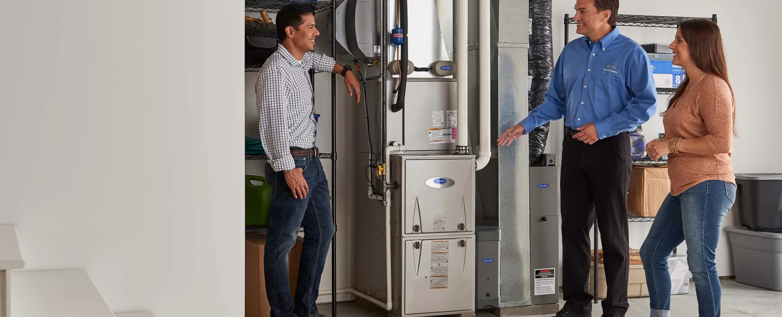 a group of people standing in a room with machines