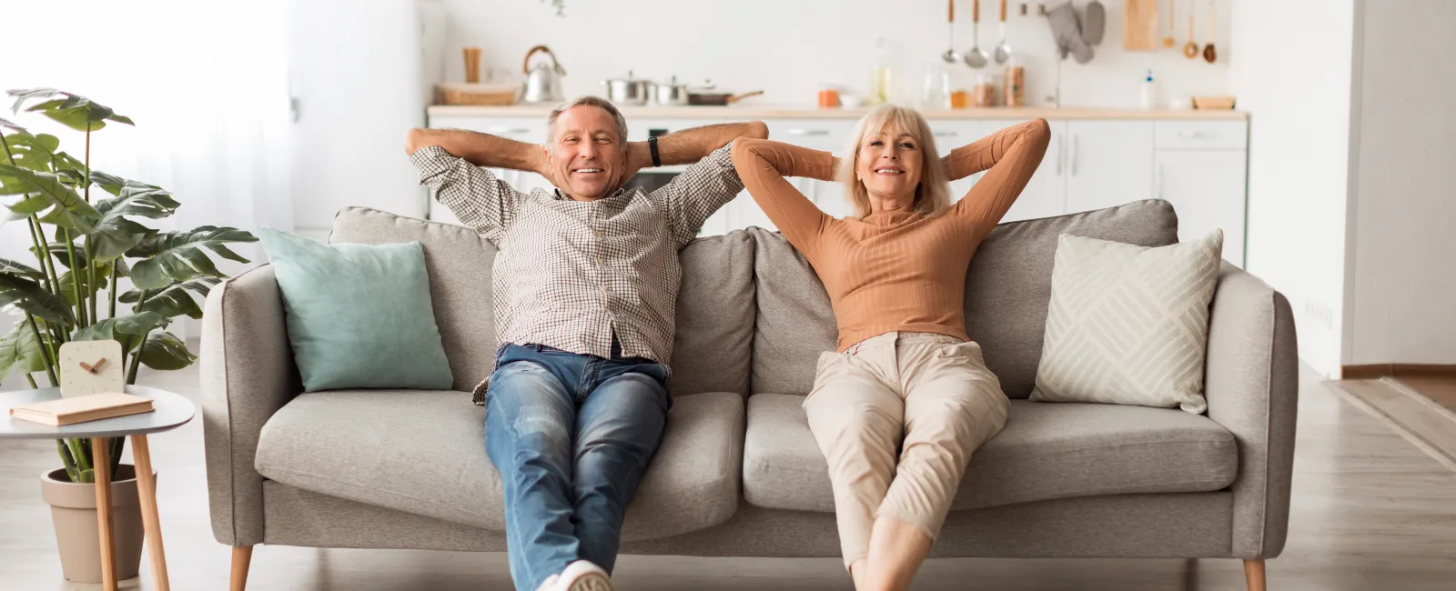 a man and woman sitting on a couch