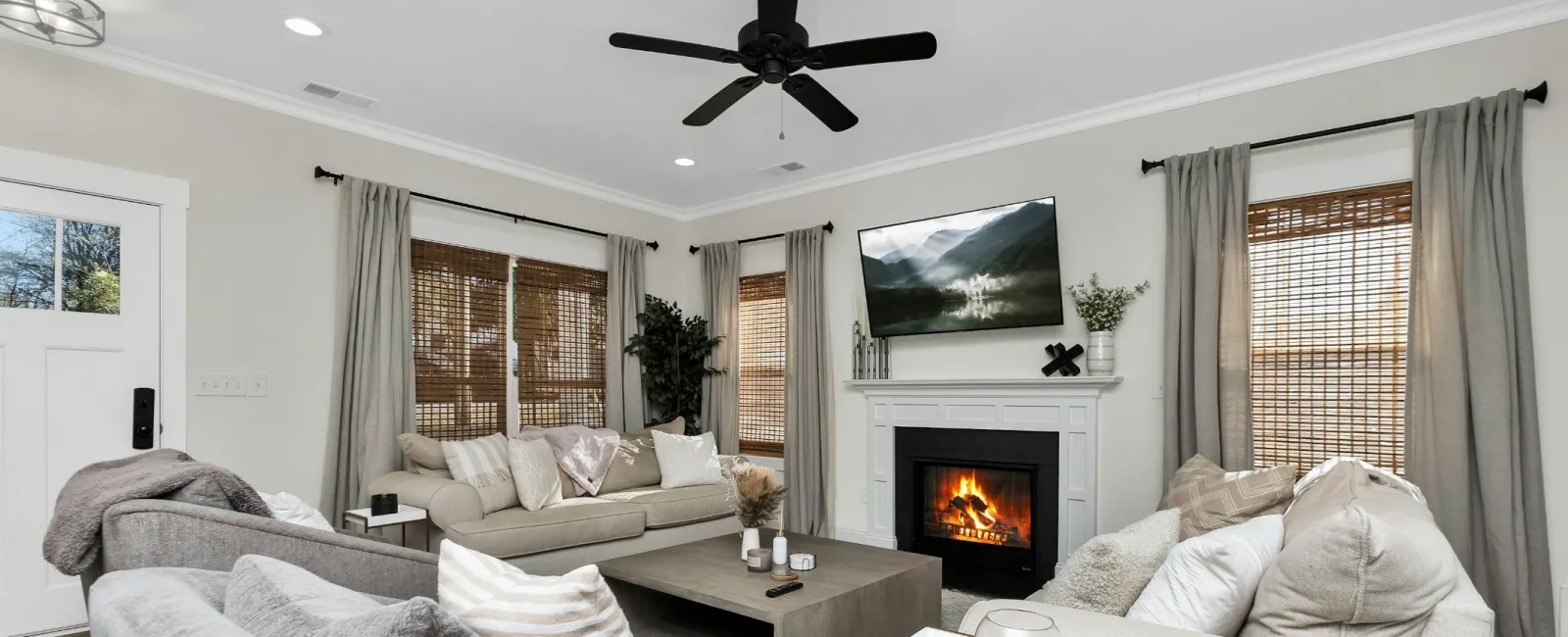 a living room with a fireplace