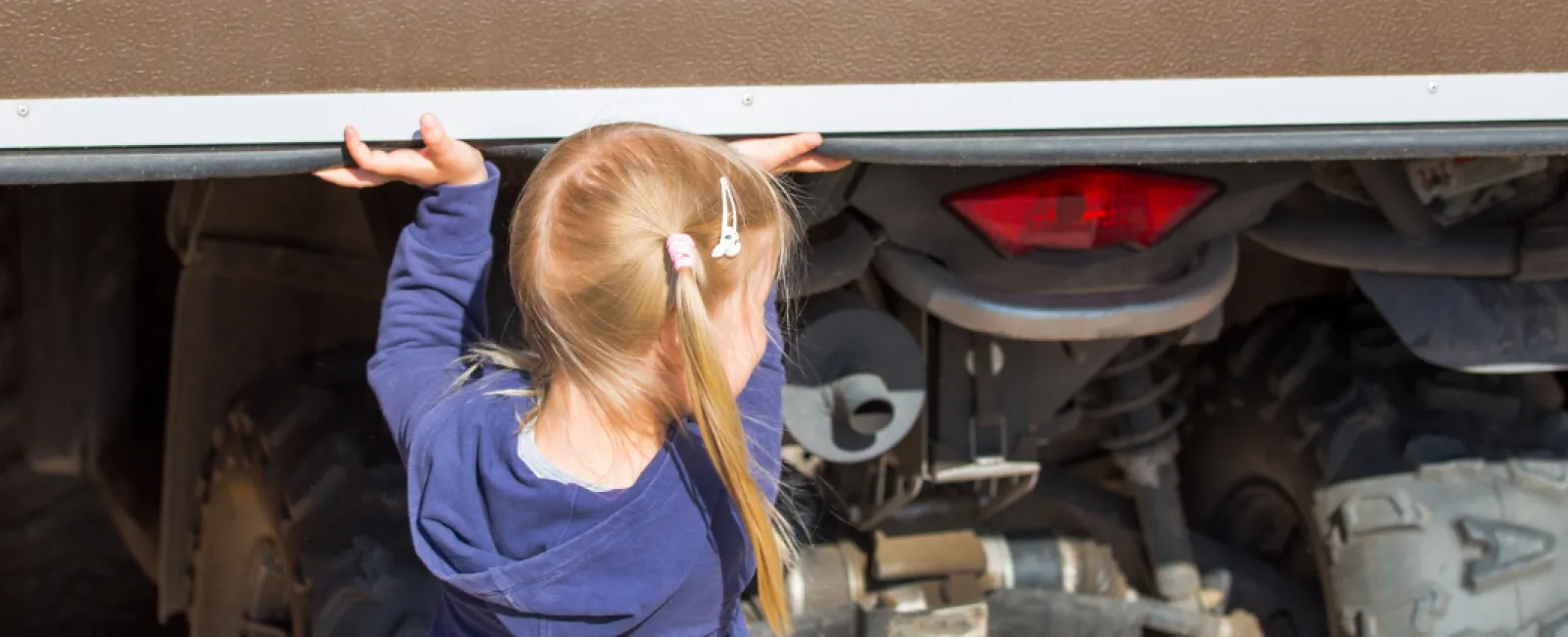 a person looking at a car