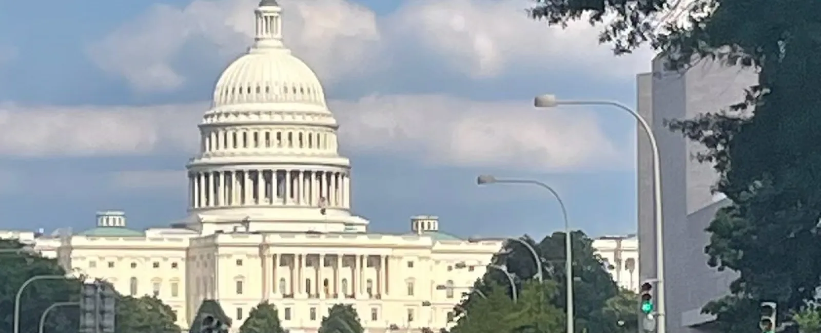 a large white building with a dome