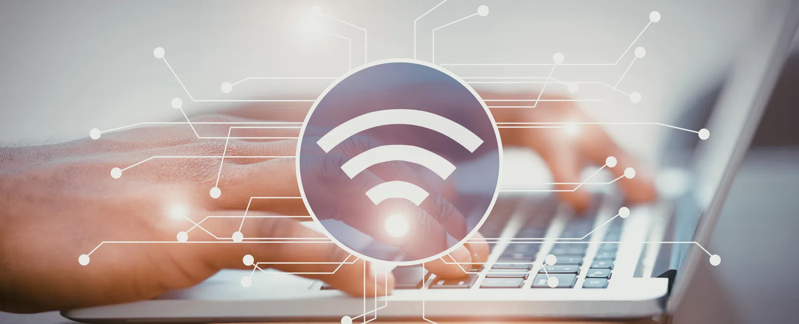Person typing on laptop with WiFi symbol and digital network lines overlay representing wireless internet connection.