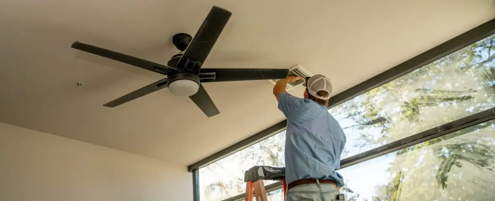 a man working on a ceiling