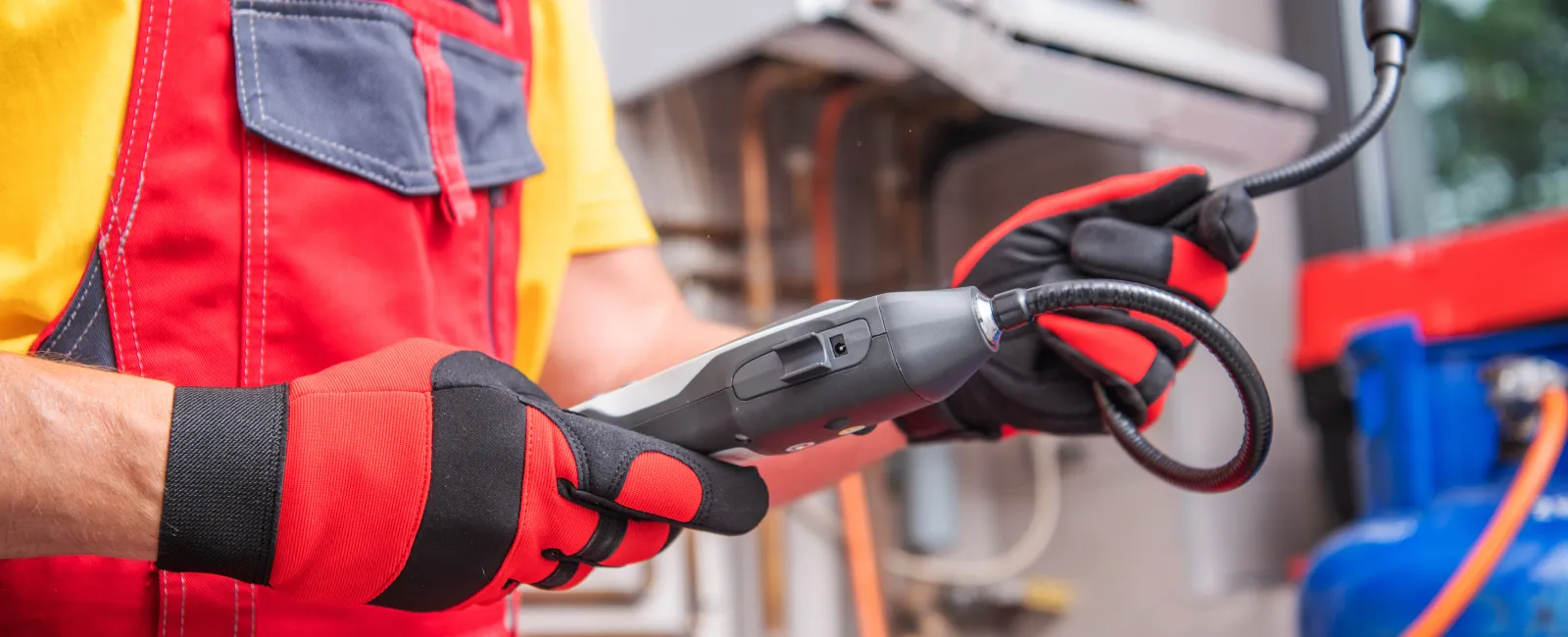 a firefighter using a hose