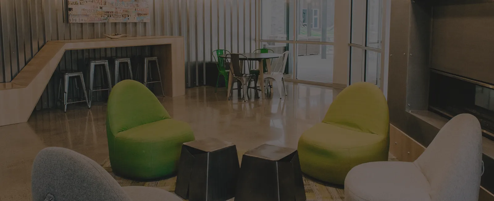 a room with green chairs
