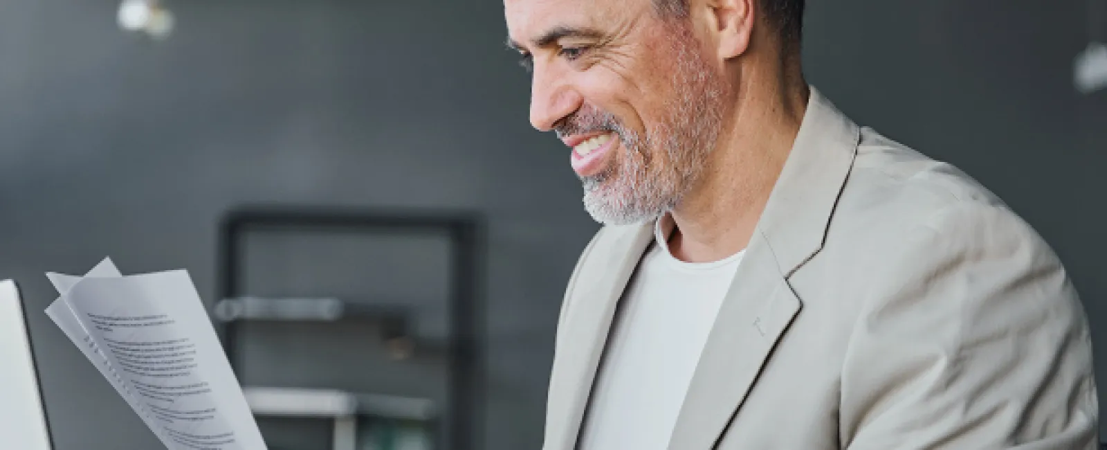 man researches donor retention rates with his device