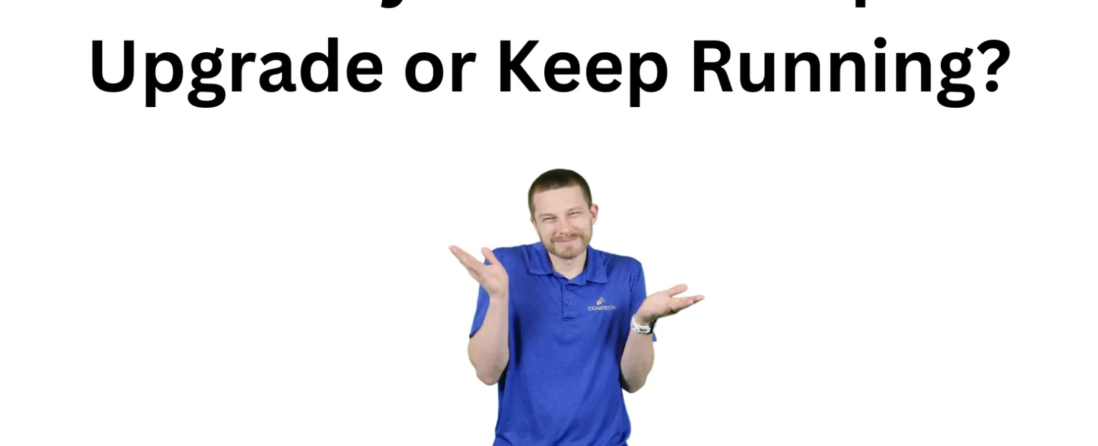 Man in blue shirt shrugging under text about computer life cycle and upgrade options with Comtech logo.