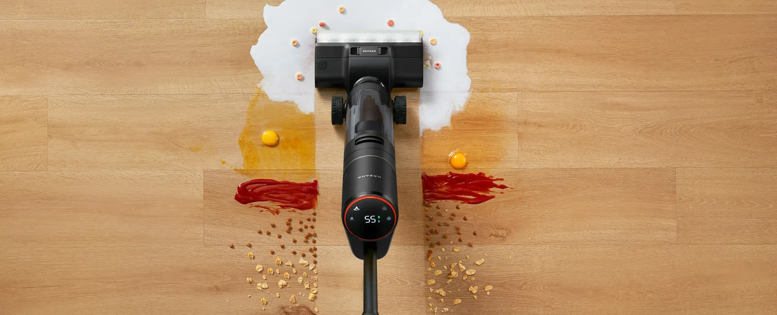 Vacuum cleaner effectively cleaning spilled milk, eggs, ketchup, cereal, and powder from hardwood floor.