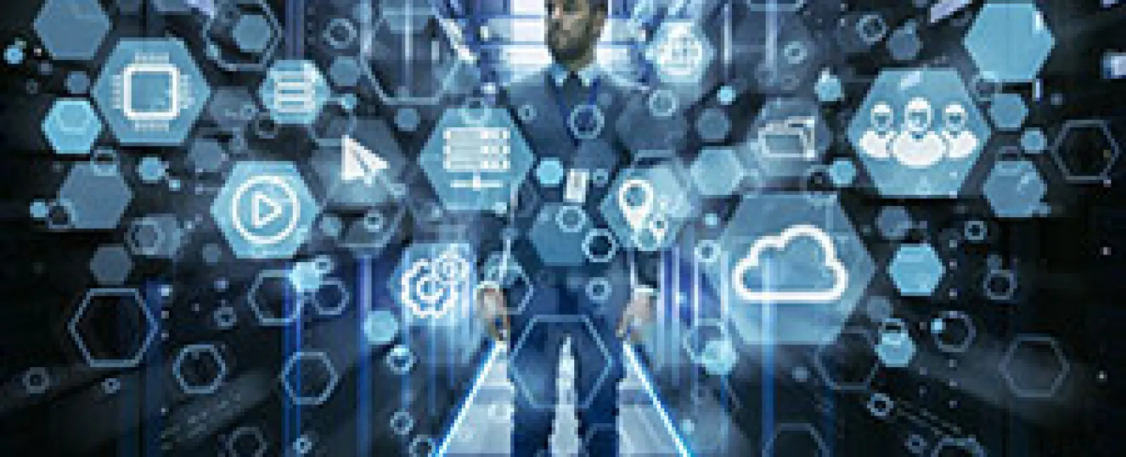 Businessman in server room surrounded by digital icons representing cloud computing and technology.