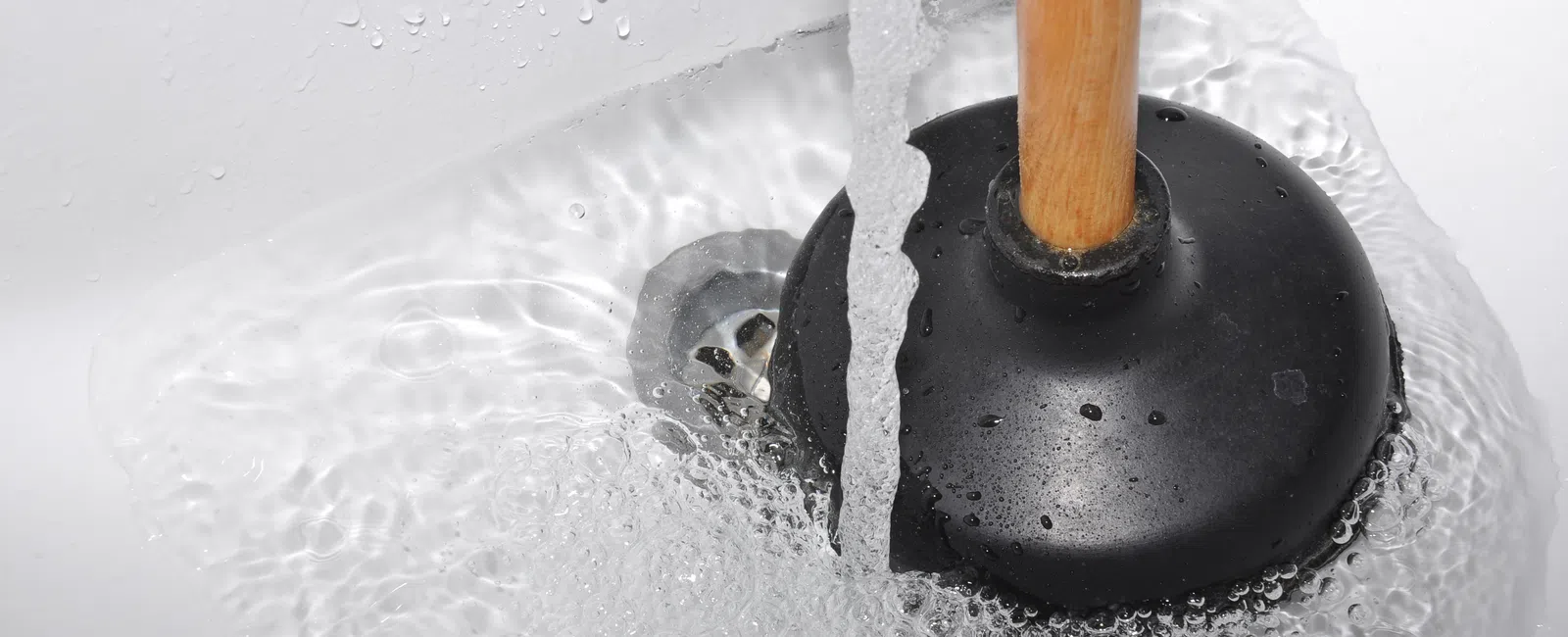 Clogged Drain Symptoms That Point to Your Main Line