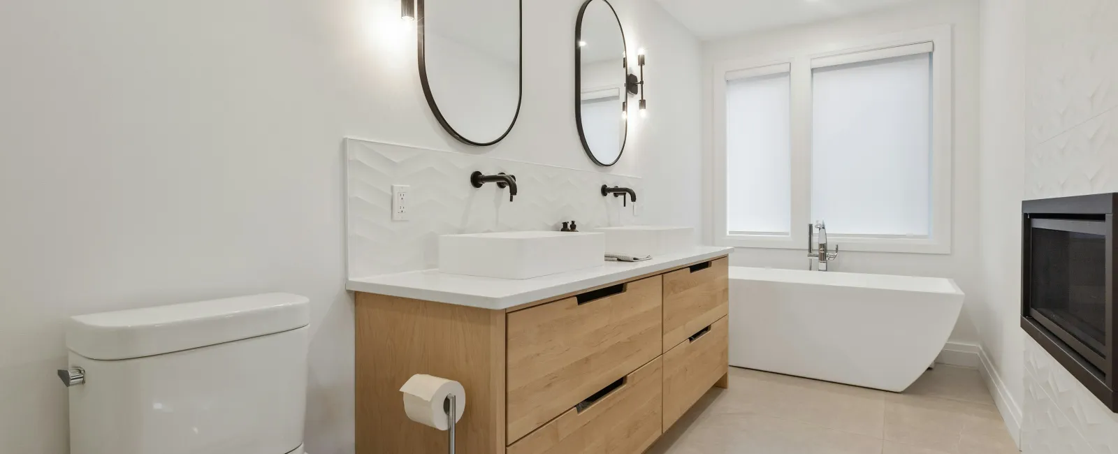 a bathroom with a tub sink and toilet