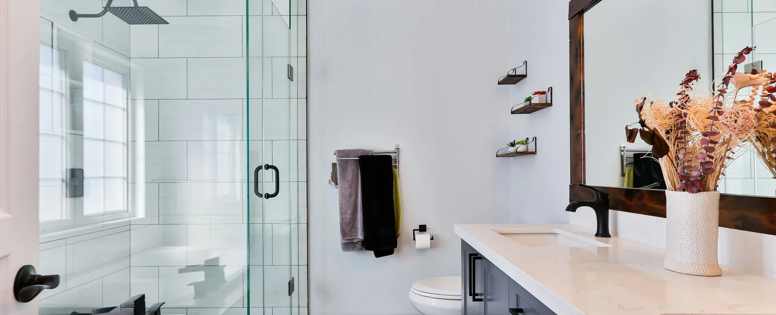 a bathroom with a glass shower