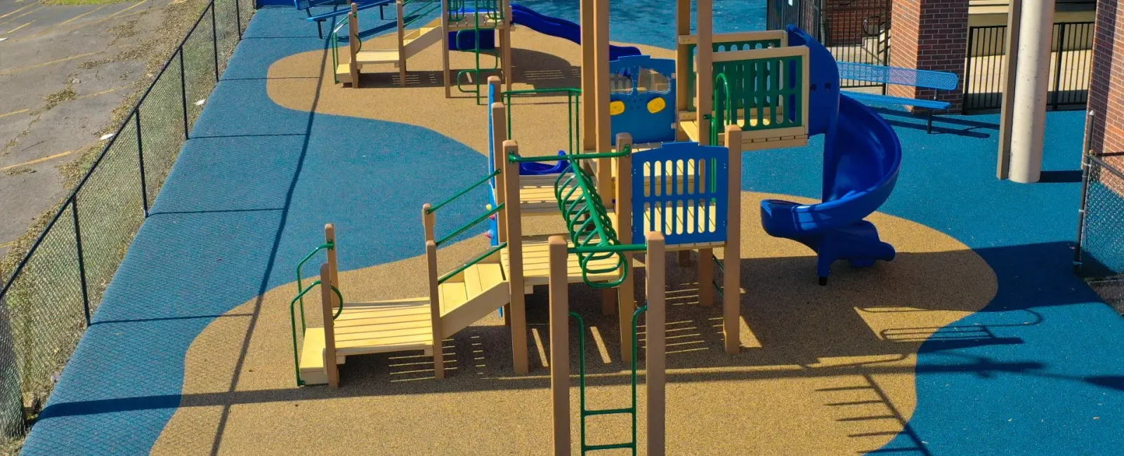 a playground with blue chairs