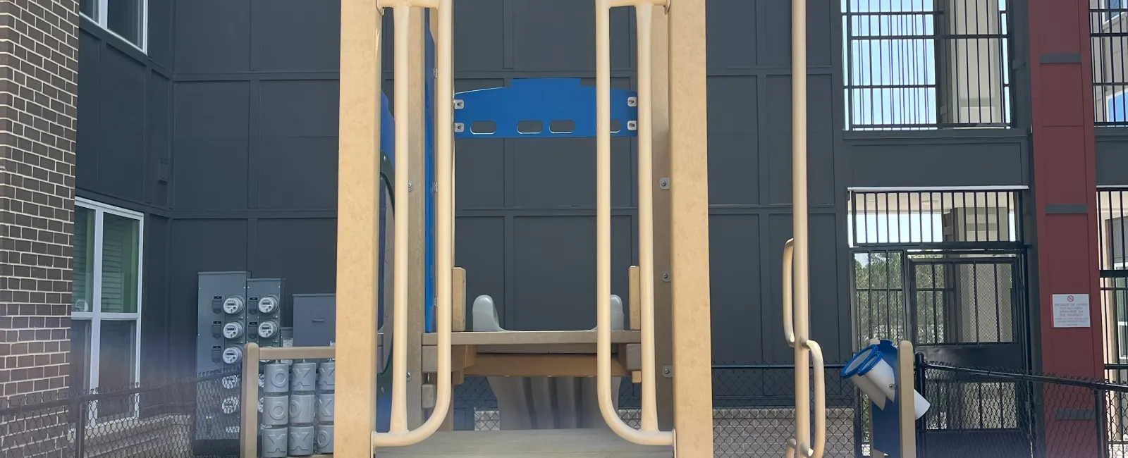 a play structure outside a building