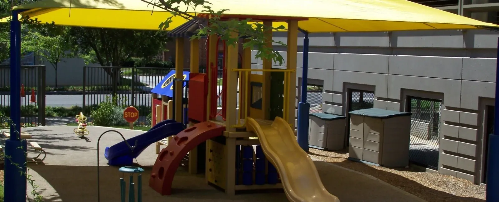 a play set outside a building