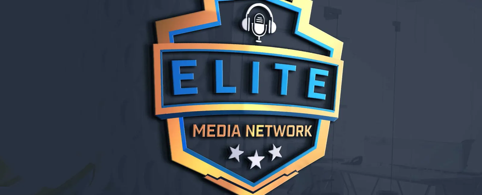 Elite Media Network logo with microphone icon and three stars in blue and gold colors on office wall.