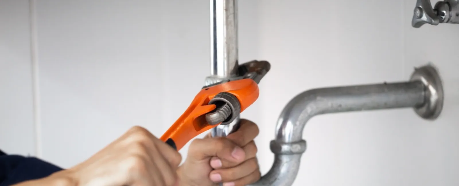 a person using a faucet