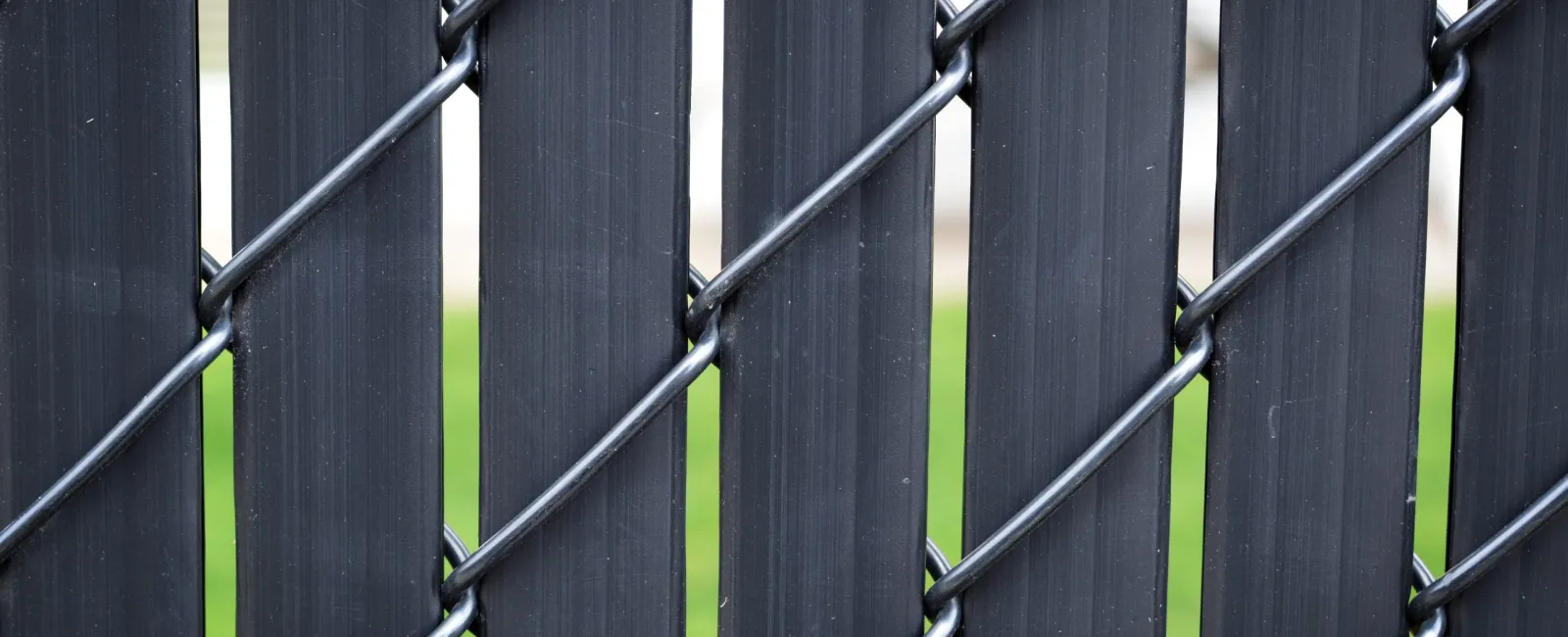 Chain Link Fence with Slats for Functional Privacy