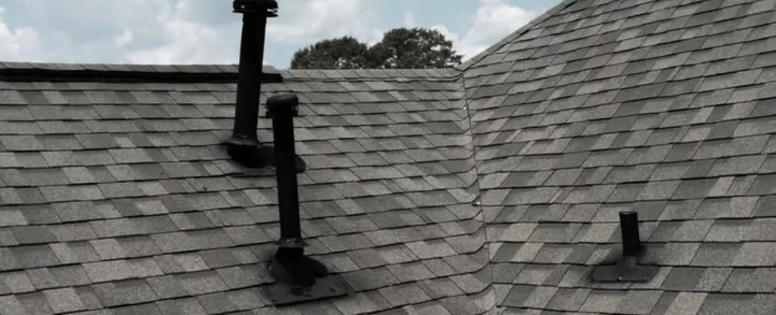 a roof with a few black poles