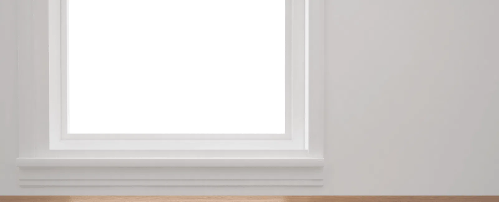Empty wooden table with sunlight near a white window in a bright minimal room.