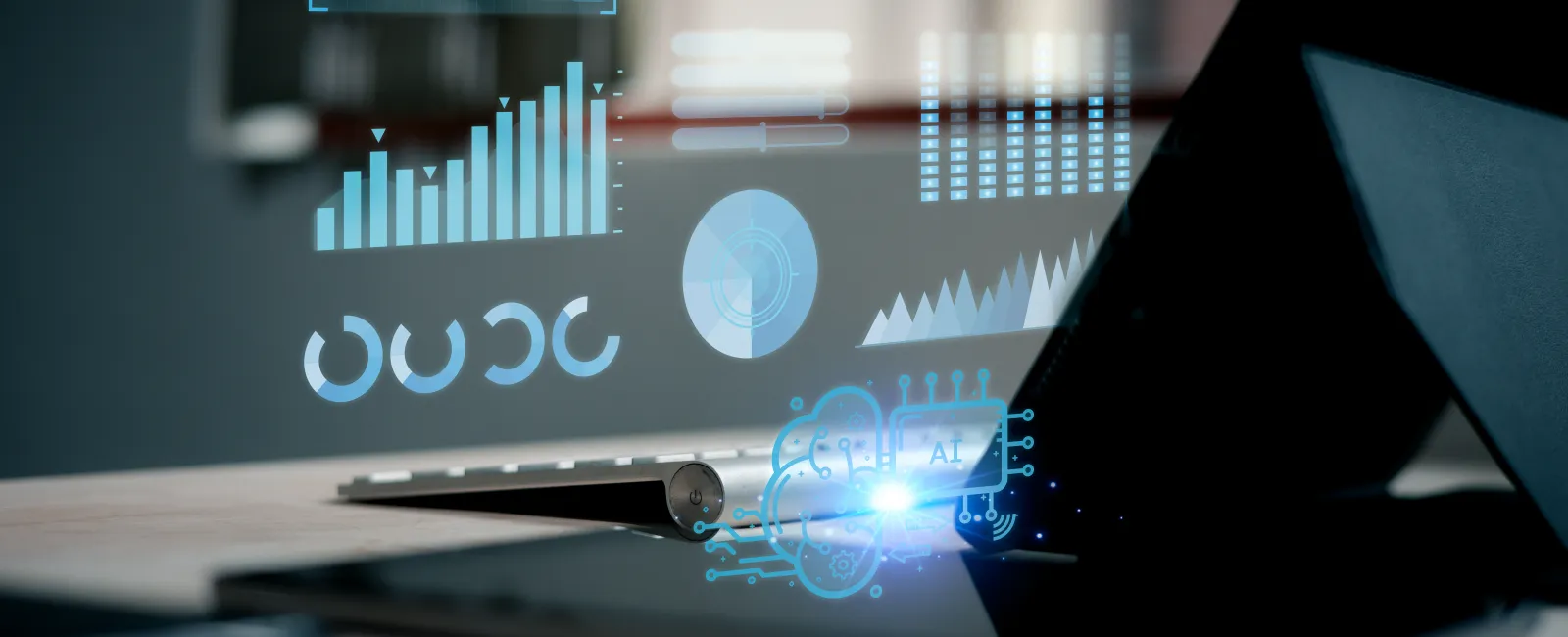 Laptop on desk displaying floating AI data visualizations and graphs in a modern workspace environment