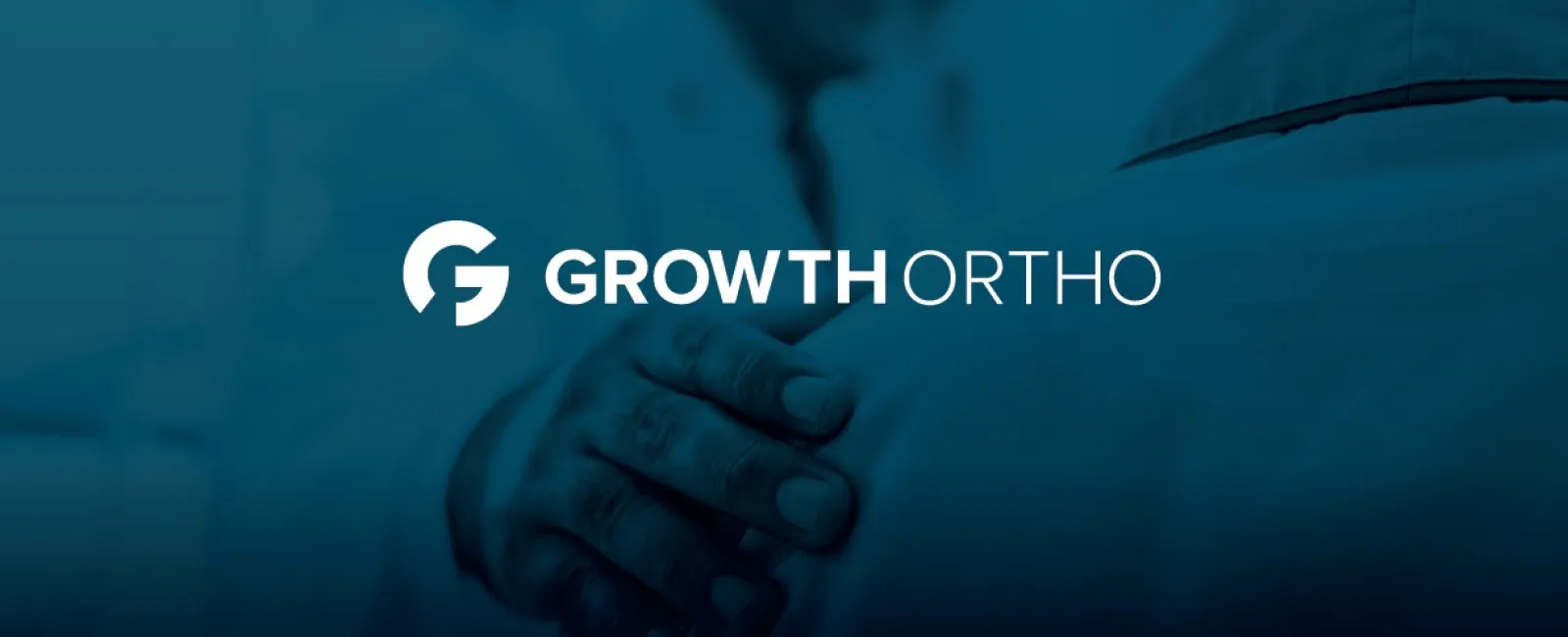 Growth Ortho logo over a blurred background of a doctor examining a patient's shoulder in blue tones