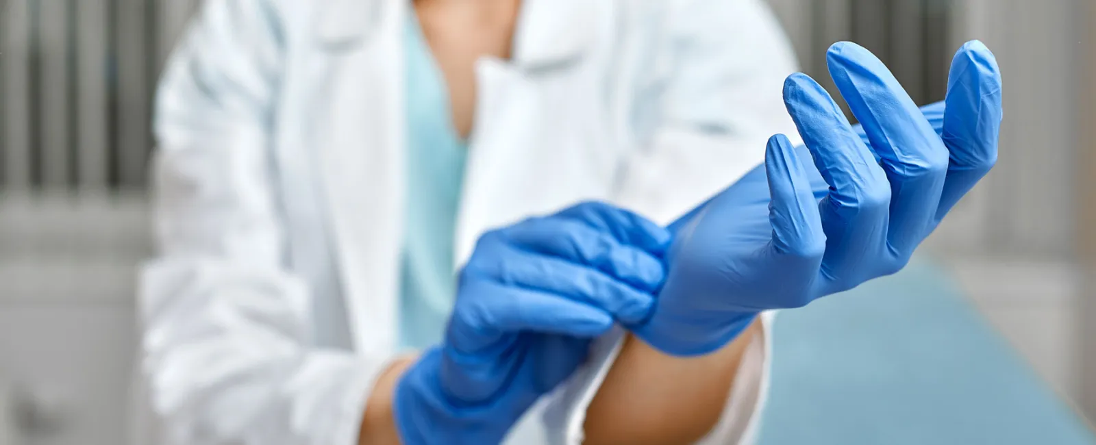 a medical professional wearing gloves