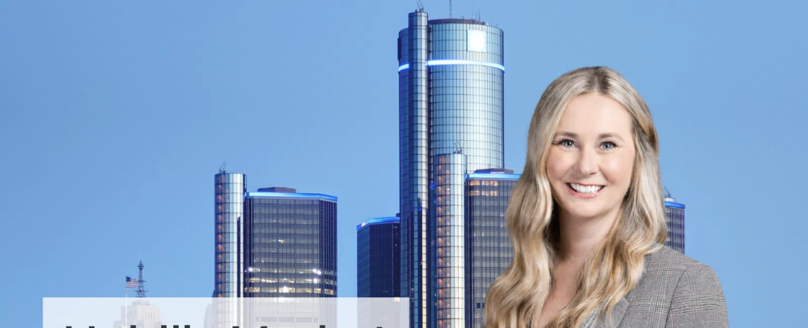 Smiling woman in blazer stands before Detroit skyline with text Heidi’s Market of the Month: Detroit, MI.
