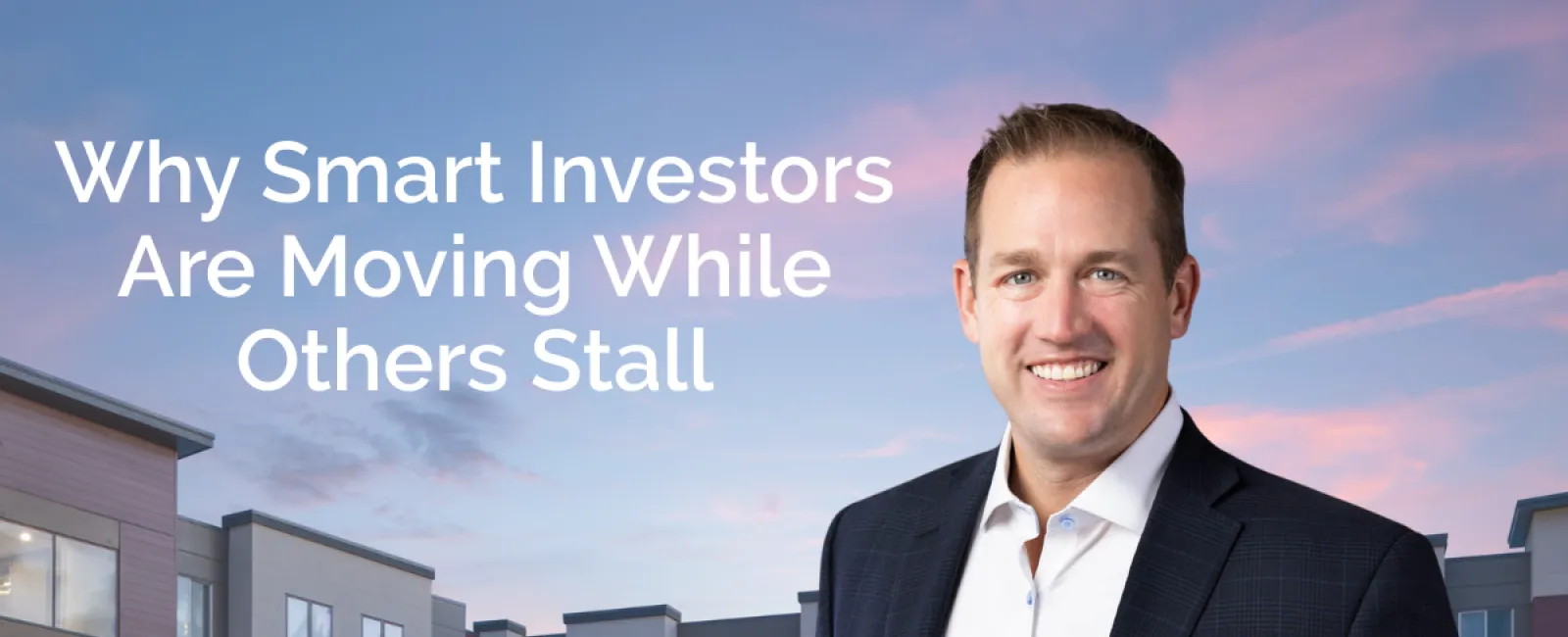 Smiling man in business suit stands in front of modern apartment complex at dusk with investment headline.