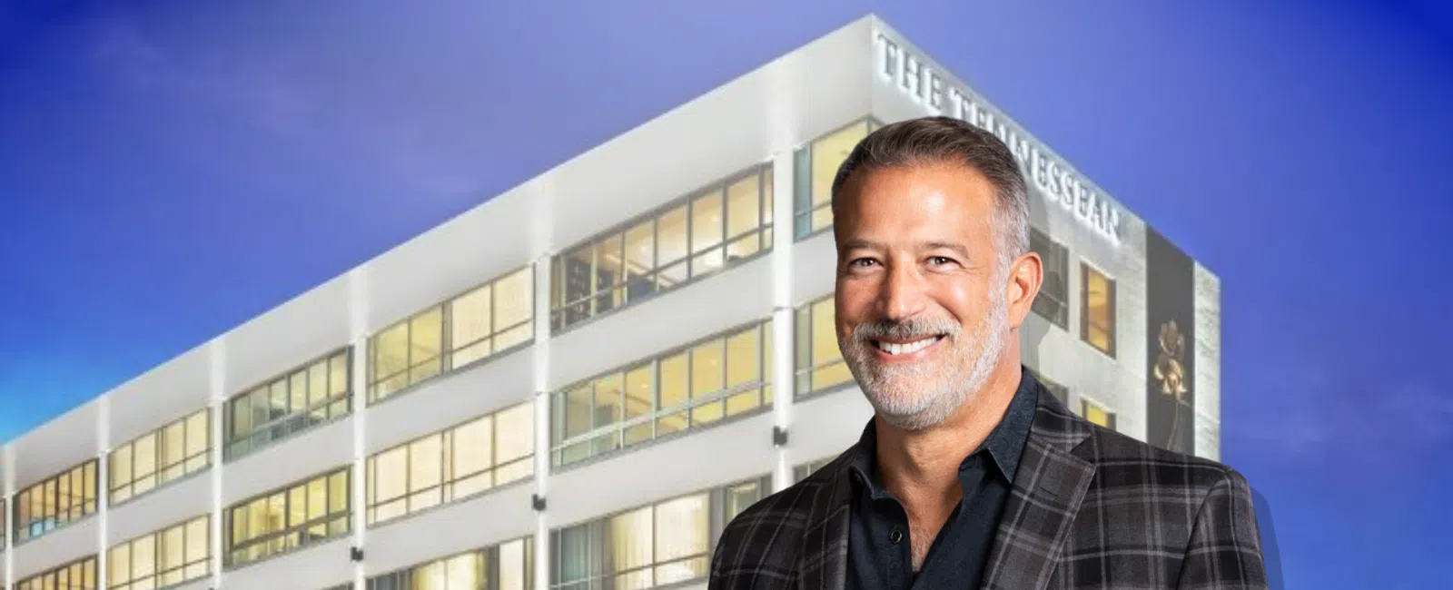 Smiling man in plaid blazer stands in front of a modern office building, with overlaid text reading Executive Profile: Pete Sams