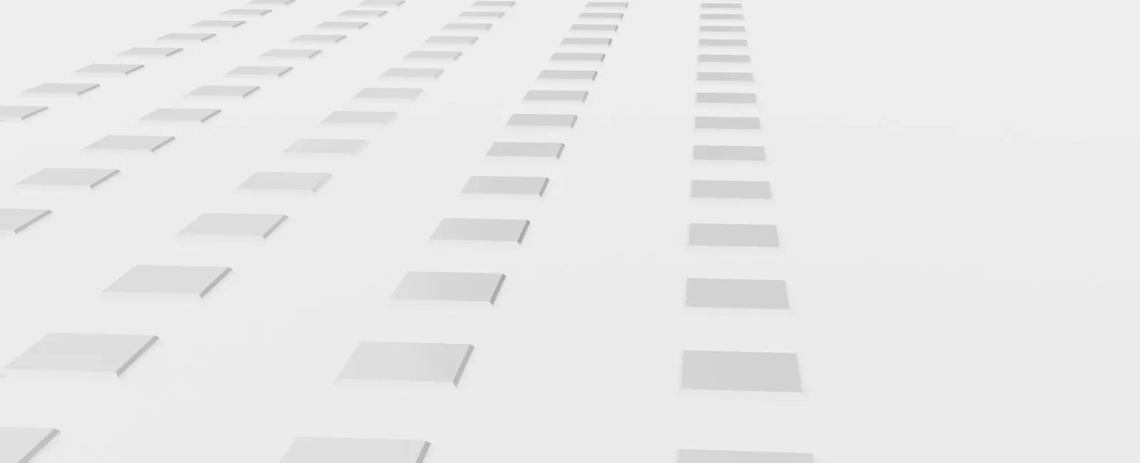 Rows of white 3D squares arranged on a light gray surface creating depth and perspective