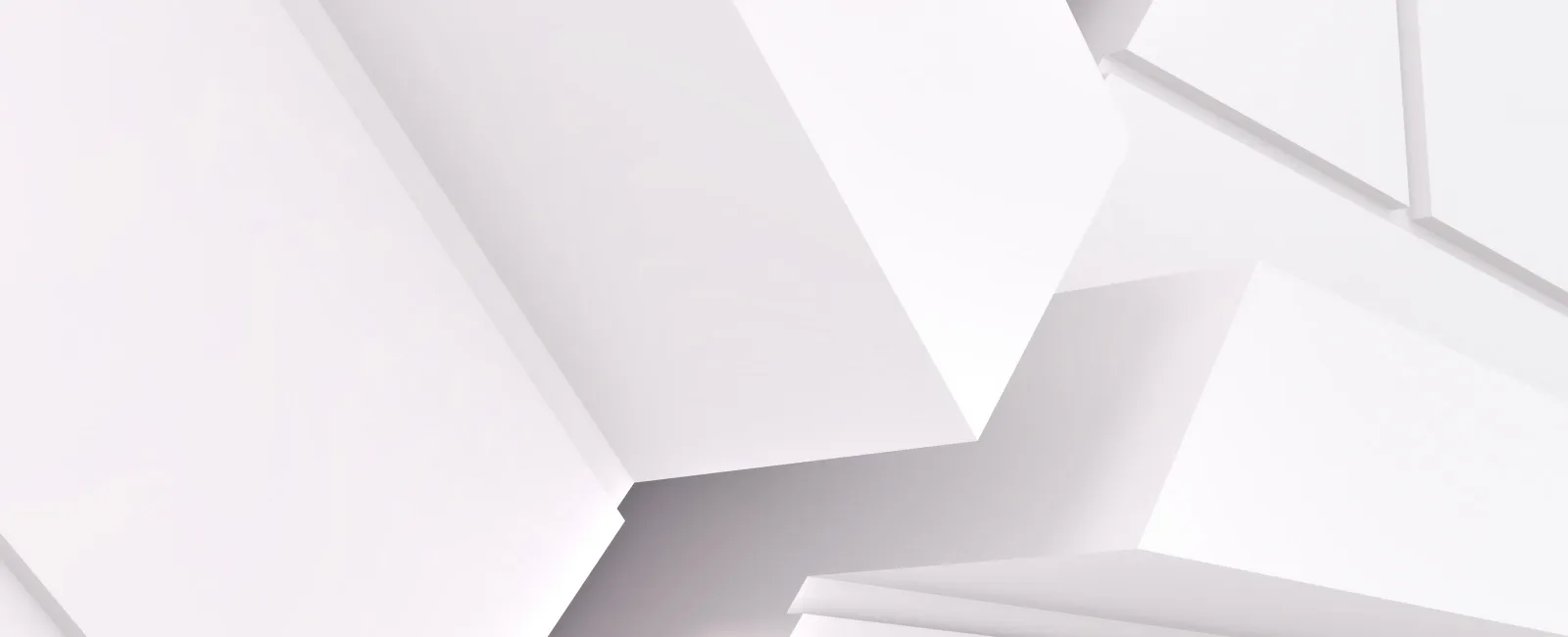 Abstract white geometric shapes with sharp edges creating a modern minimalist composition.