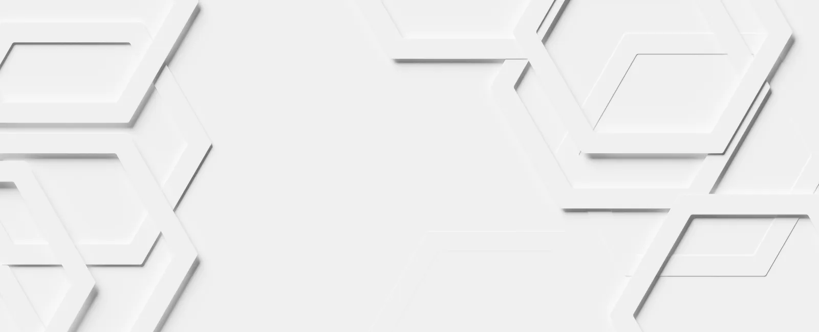 White hexagonal shapes layered on a light gray background creating a modern geometric pattern.
