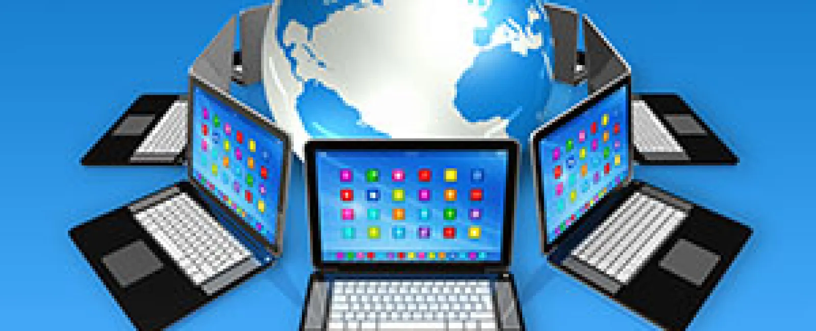 a group of laptops with a globe in the background