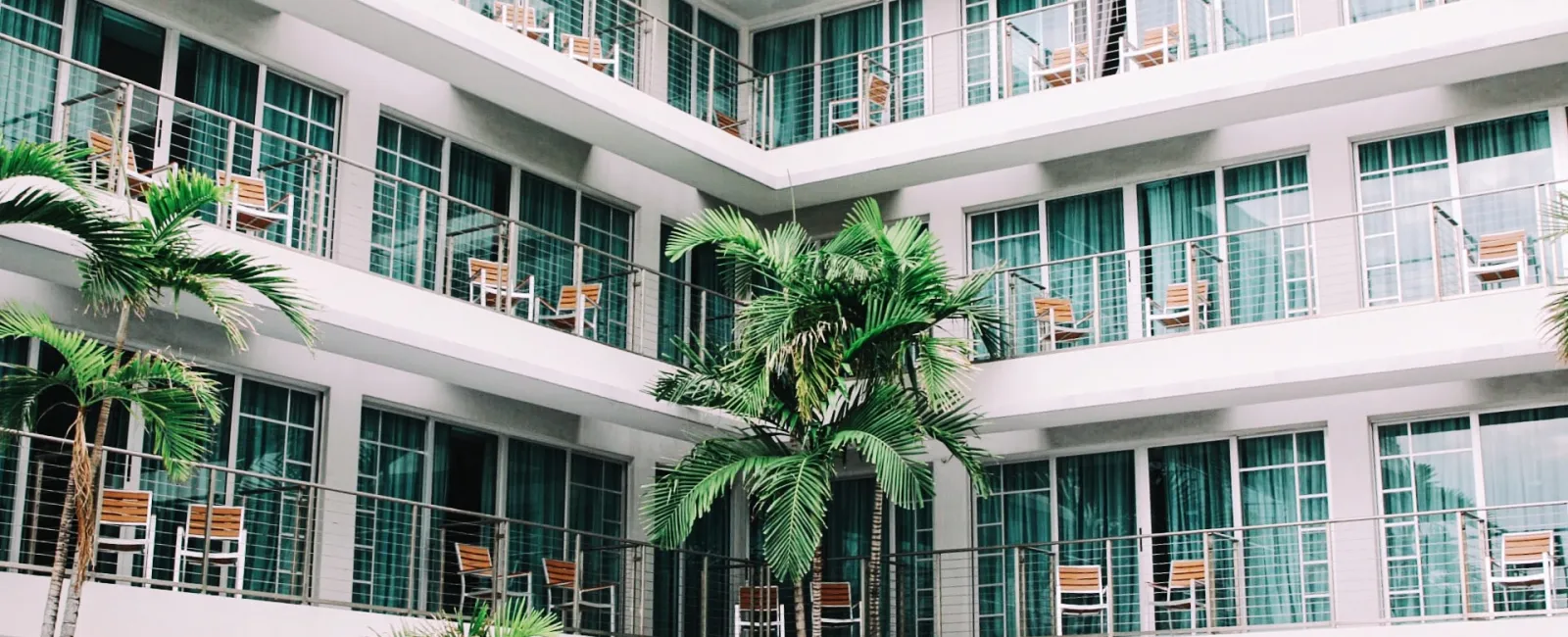 a building with palm trees