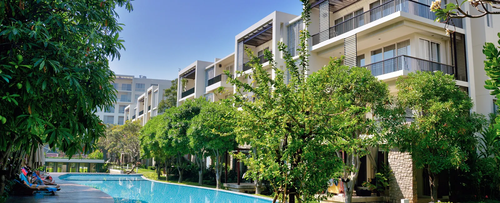 a pool in front of a building