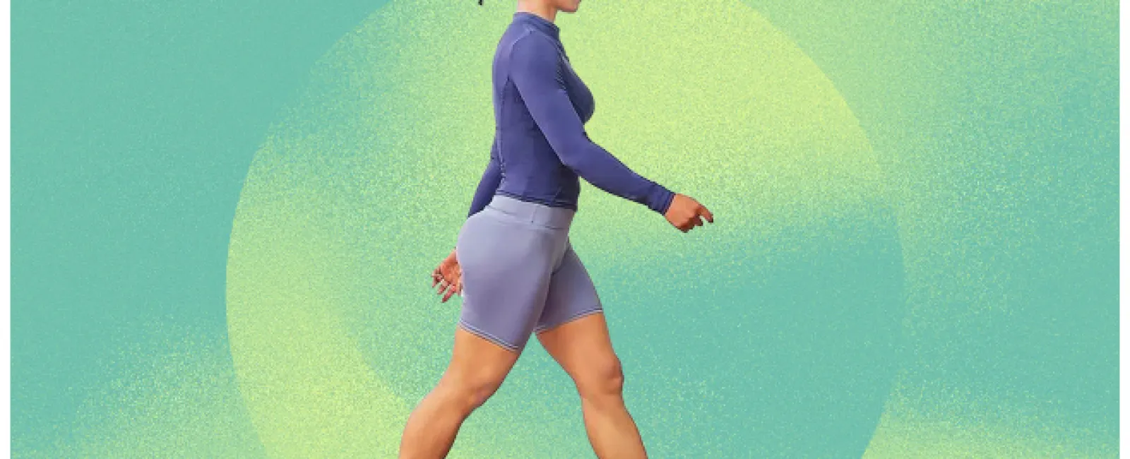 Woman walking on a sleek treadmill designed for home workouts and walking breaks, wearing activewear.