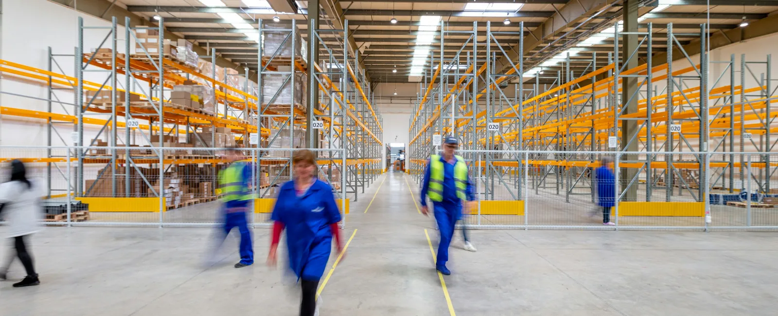 a group of people in a warehouse