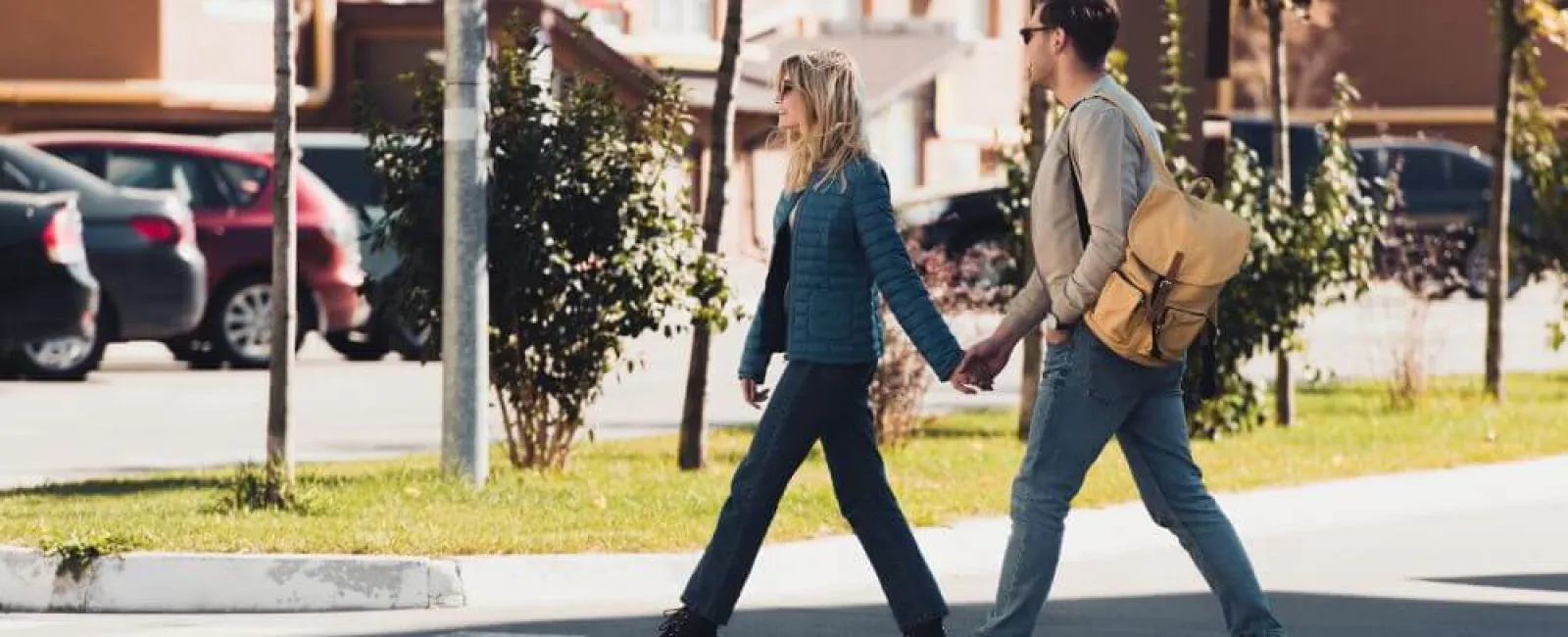 a man and a woman walking on a street