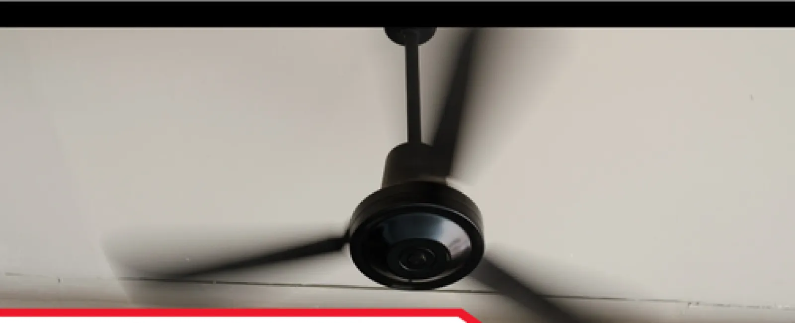 Ceiling fan with blurred blades in motion under headline about pulley system discovery