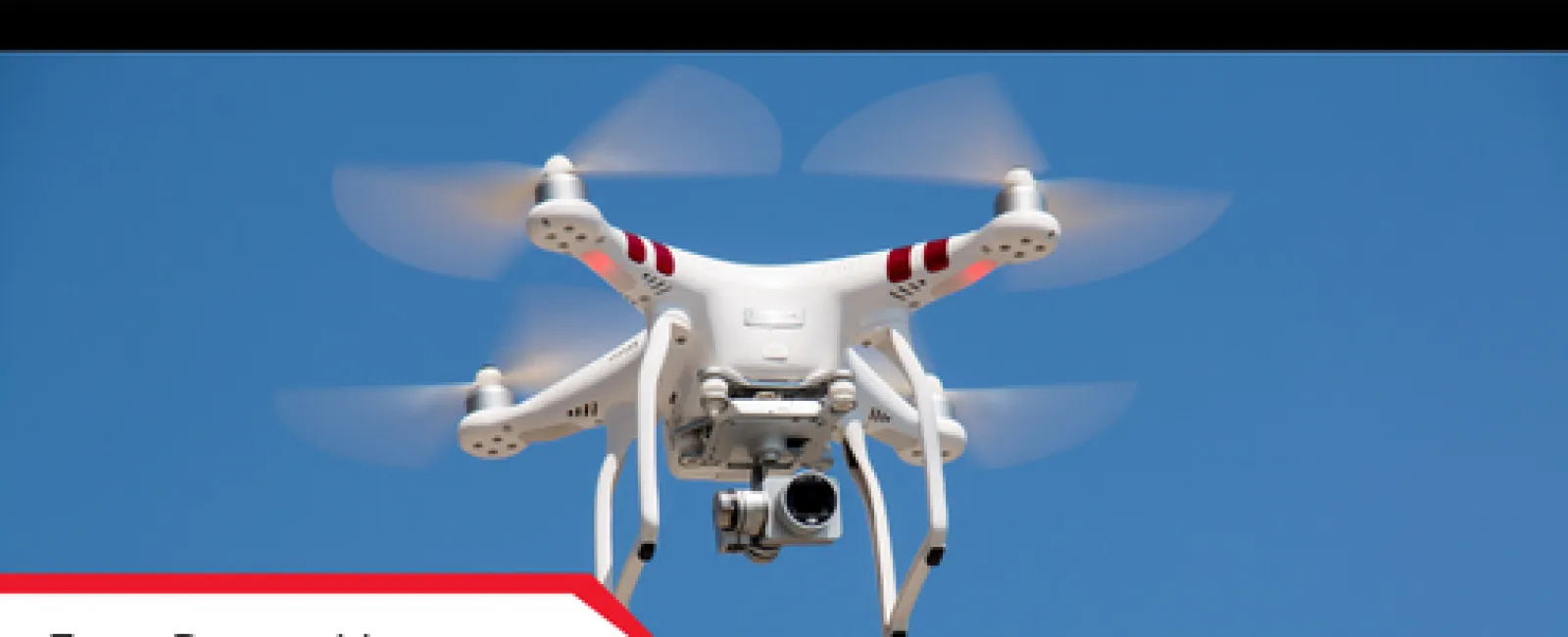 White quadcopter drone hovering with spinning rotors against clear blue sky and promotional text.