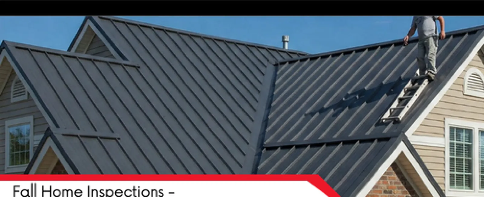 Home inspector stands on a metal roof checking for issues during a fall home inspection on a sunny day.