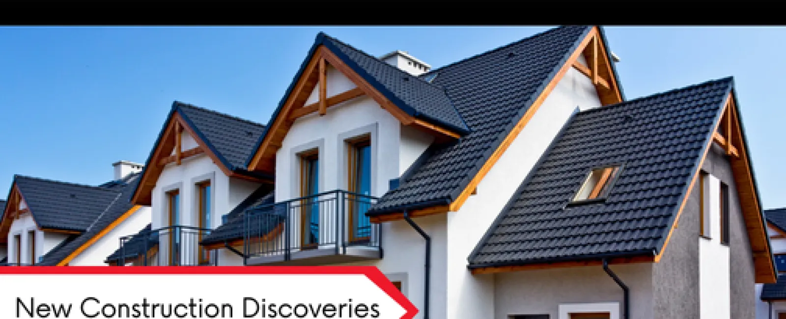 Modern newly constructed white houses with dark roofs under blue sky and text New Construction Discoveries.