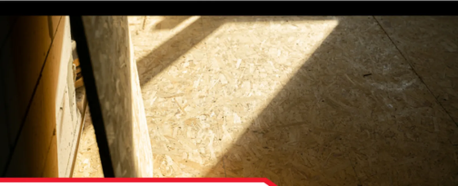 Sunlight casting shadows on plywood subfloor in crawlspace focusing on insulation and moisture prevention.