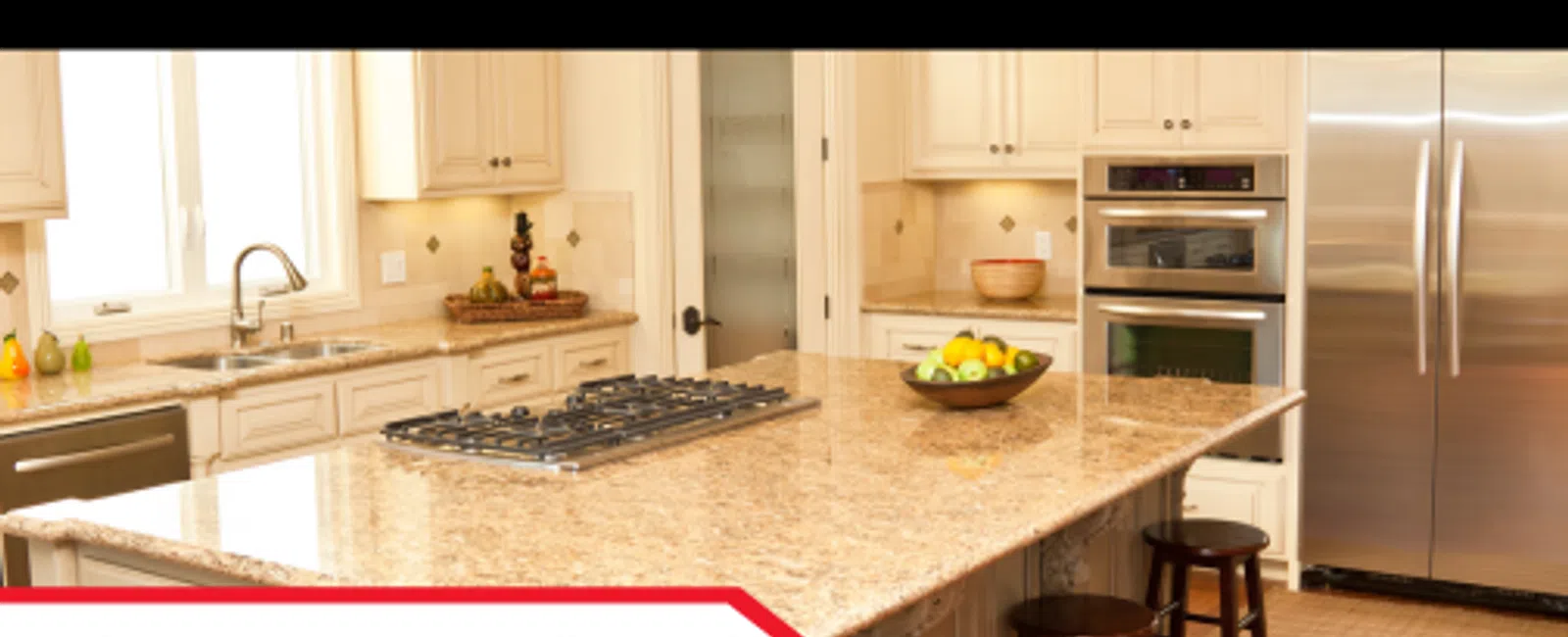 Bright modern kitchen with granite island, stainless steel appliances, and wooden stools highlighting home inspection importance.