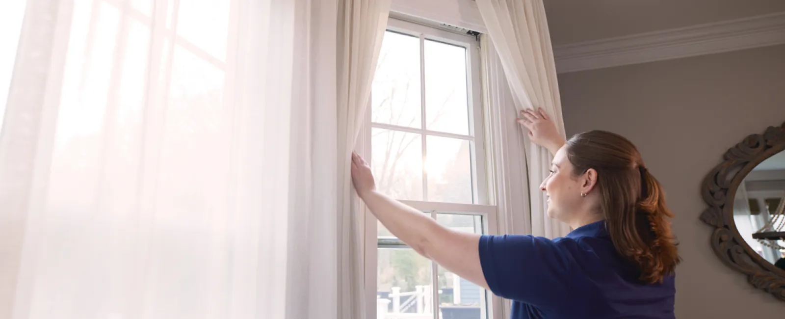a person looking out the window